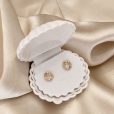 The Léonie Studs by Bone & Ivory, faceted zircon studs in organic 18K gold-plated settings