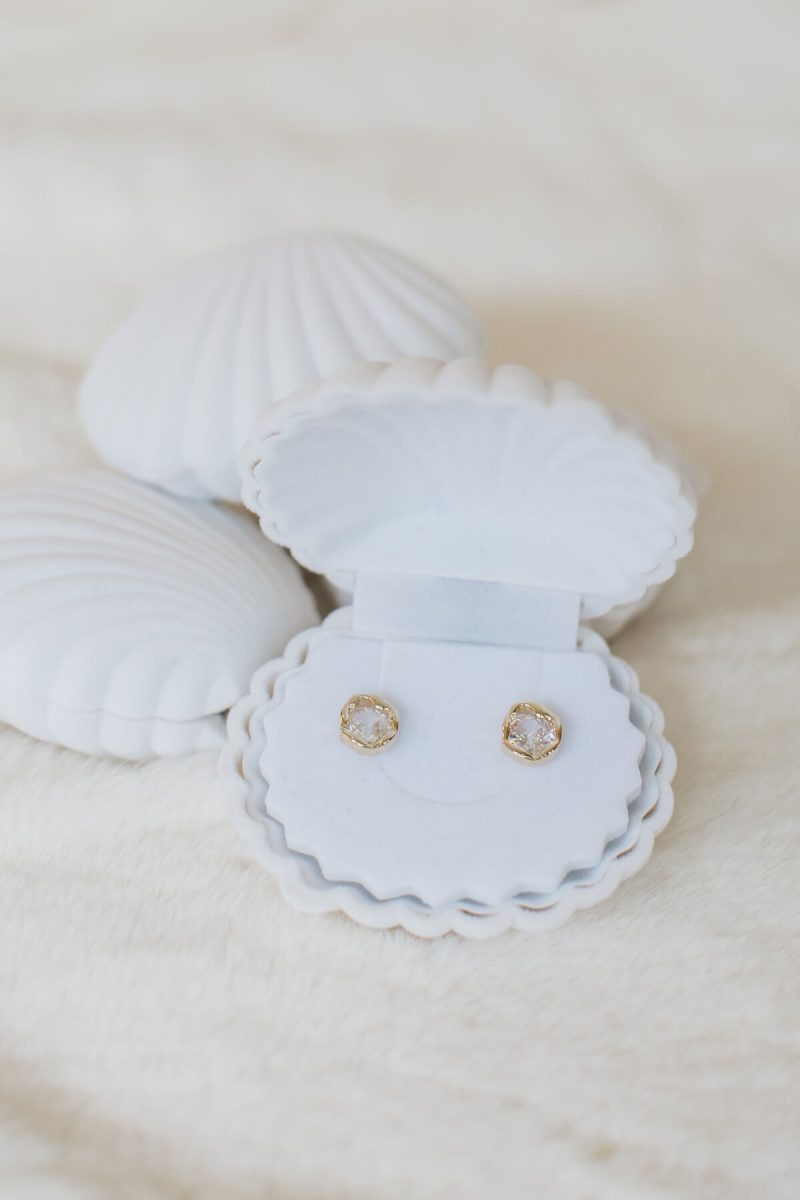 Léonie zircon studs with softly irregular, molten-look gold frames