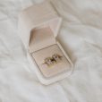 Matrix Studs detail showing the elongated rectangular cubic zirconia and streamlined gold setting