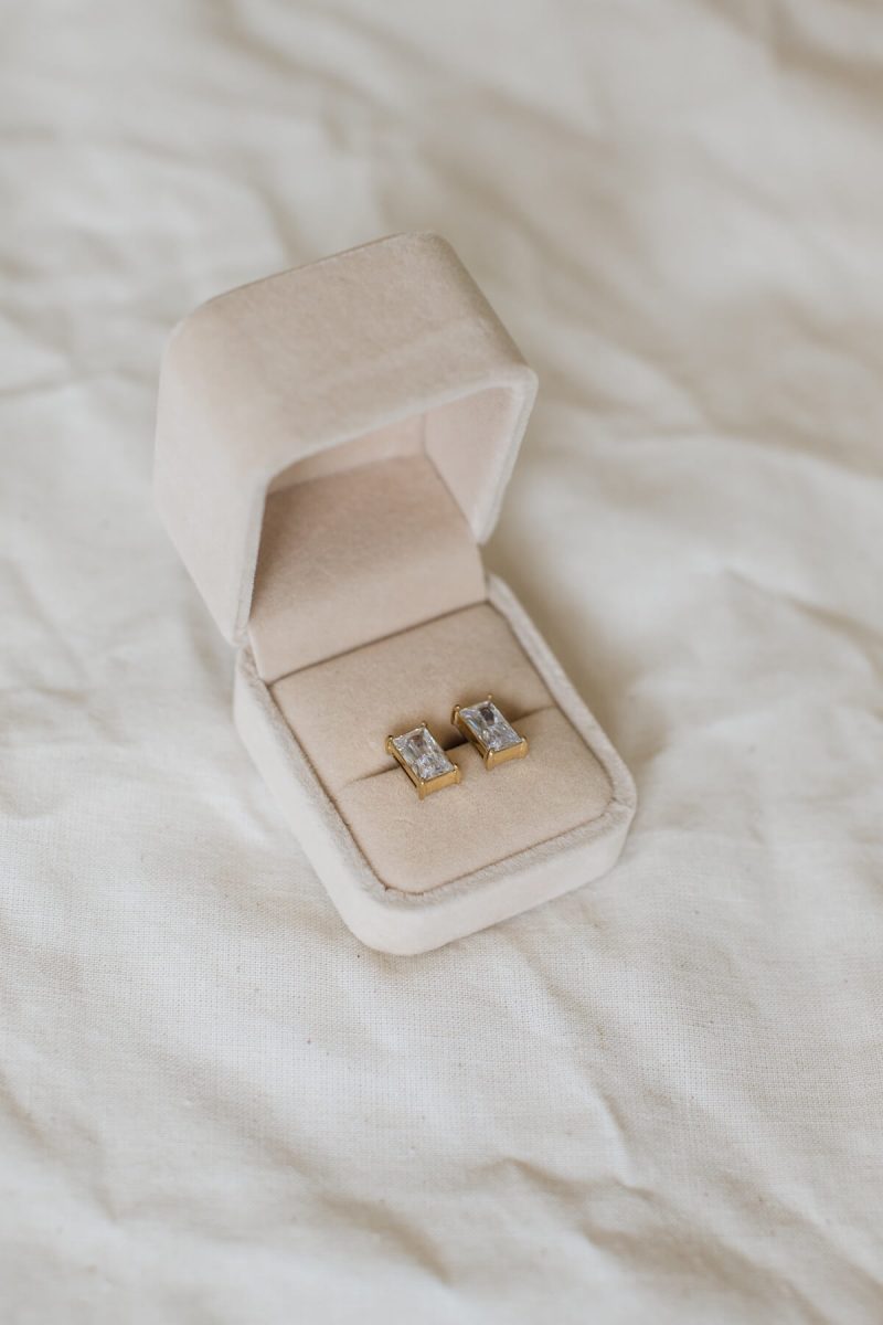 The Matrix Earrings 2 Matrix Studs detail showing the elongated rectangular cubic zirconia and streamlined gold setting