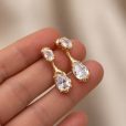Sidonie stud and drop earrings showing the oval zircon stud joined to the teardrop pendant